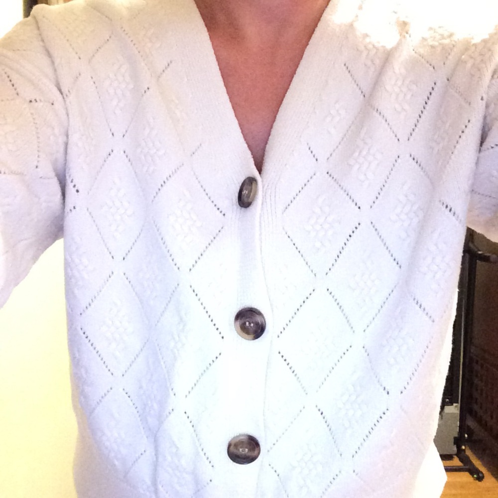 Women’s cream sweater by Cyrus
